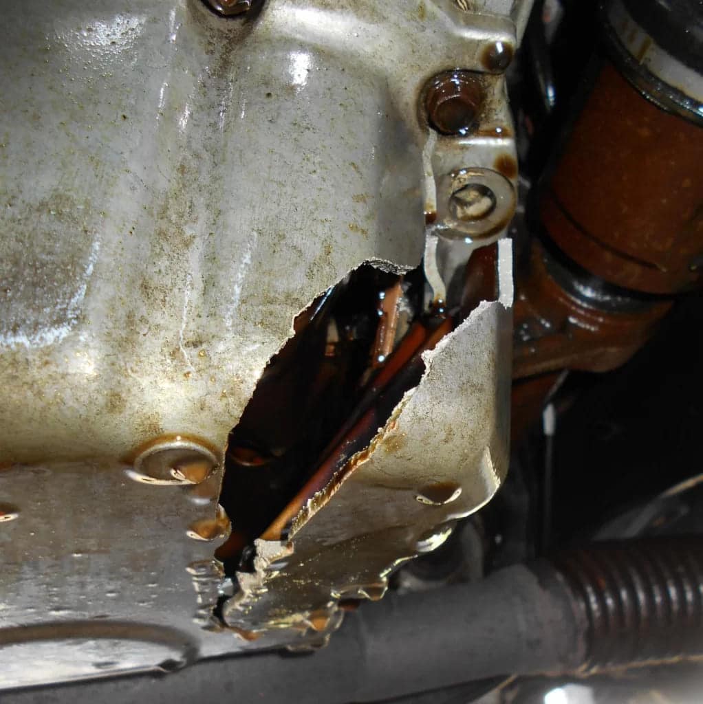 3. Cracked Oil Pan Resulting in Car Leaking Oil