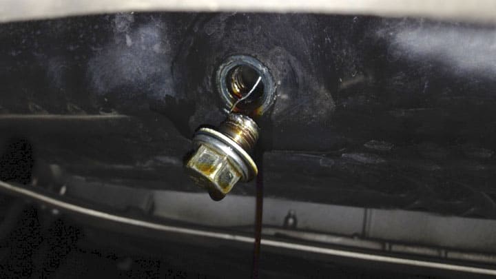 2. Loose or Damaged Oil Drain Plug Leading to Car Leaking Oil