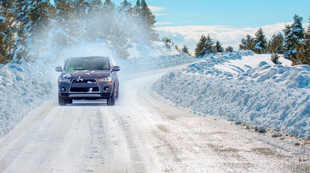 A front view of a car in snow