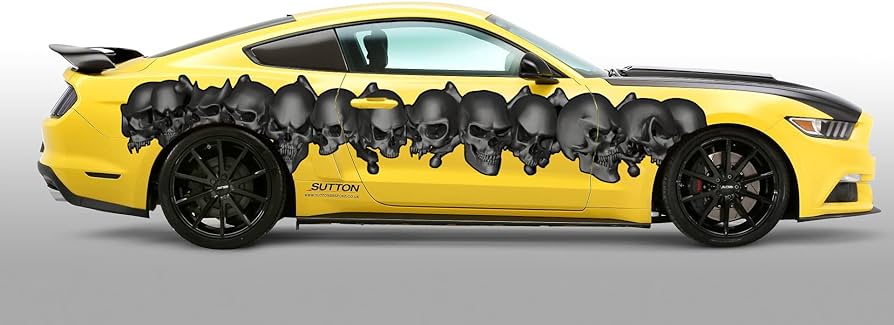 A side view of a car with D yellow skull wrap