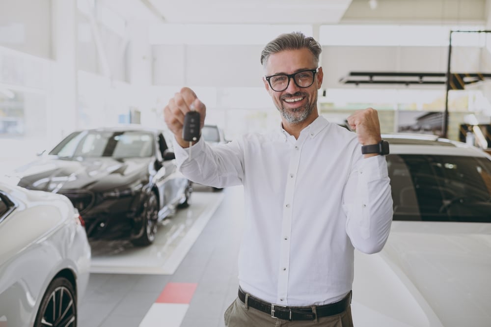 A view of a person holding the car keys