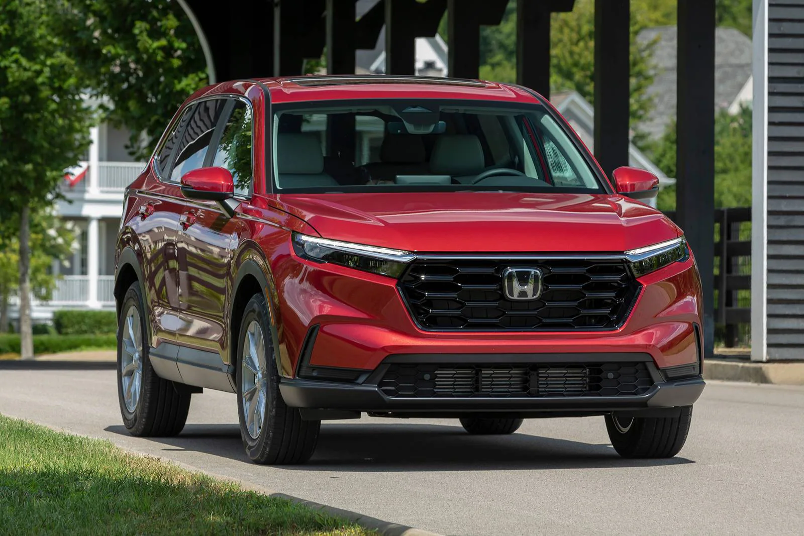 A front view of a red honda cr v