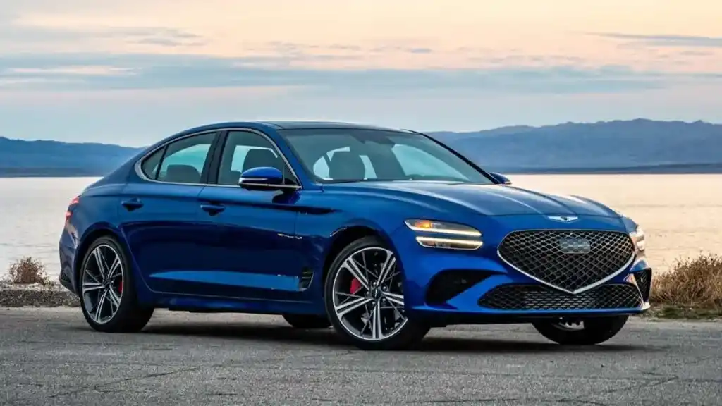 A view of a blue genesis g parked at the beach side