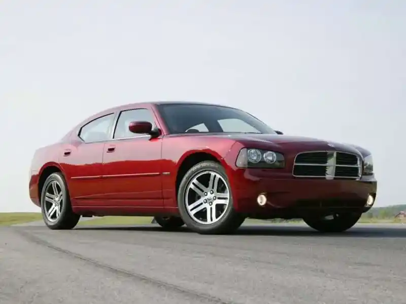 A view of a shinty red dodge charger on road